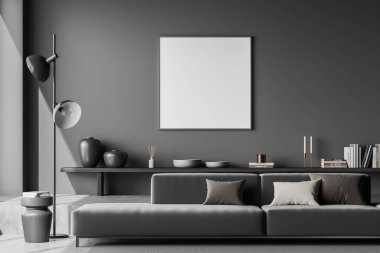 Front view on dark living room interior with empty white poster, sofa, grey wall, coffee table, concrete floor, podium. Concept of minimalist design. Place for meeting. Mock up. 3d rendering