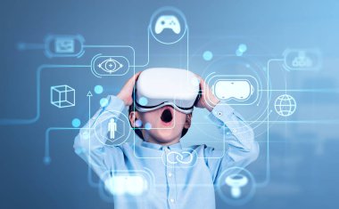 Excited child boy in vr headset, cyberspace hologram helpdesk with glowing icons circuit. Concept of metaverse and immersive technology