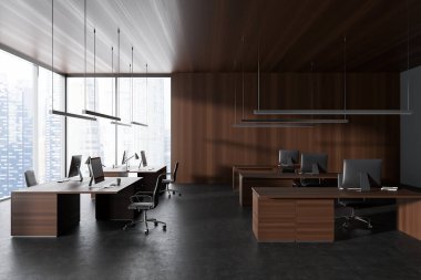 Front view on dark office room interior with computers, desks, armchairs, panoramic window with skyscraper view, concrete floor. Concept of company, firm, meeting space. 3d rendering
