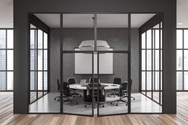 Front view on dark office room interior with armchair, poster, conference board, panoramic window, concrete floor, glass partition, concrete wall. Concept of company, firm, meeting space. 3d rendering
