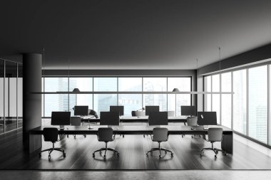 Dark business interior with armchairs and pc computer on desk, black hardwood floor. Coworking zone with panoramic window on Singapore city view. 3D rendering