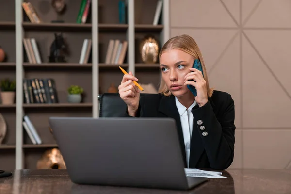 Pondering Attractive Businesswoman Wearing Formal Wear Sitting Having Online Conference — Stockfoto
