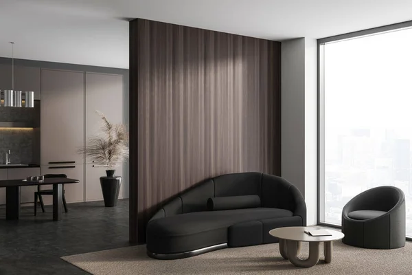 Corner view on dark studio room interior with dining table, armchairs, sofa, cupboard, brown wall, panoramic window, carpet, coffee table. Concept of minimalist design. 3d rendering