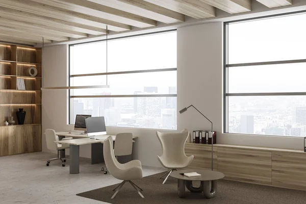 Light business interior with armchairs and coffee table, side view. Coworking area with pc computer and chill corner near panoramic window on Paris city view. 3D rendering