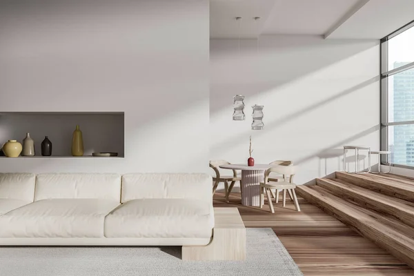 White living room interior with sofa and dining table with chairs, shelf with decoration. Stairs and panoramic window on skyscrapers. 3D rendering
