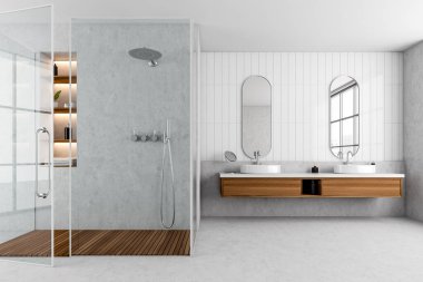 Front view on bright bathroom interior with shower, window with city skyscraper view in reflection of mirrors, sinks, shelf with towels, concrete floor. 3d rendering