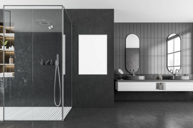 Front view on dark bathroom interior with empty white poster, shower, city skyscraper view in reflection of mirrors, sinks, shelf with towels, concrete floor. Mock up. 3d rendering