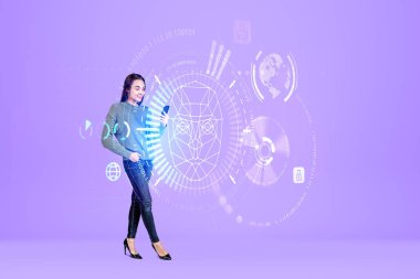 Smiling woman using smartphone, full length. Biometric verification and face detection, binary and digital hud hologram on purple background. Concept of face id and facial scanner