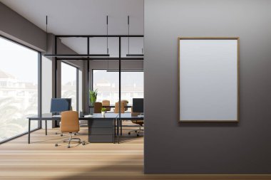 Dark office interior with armchairs, computer desktop on table, hardwood floor. Meeting room behind glass doors, panoramic window on countryside. Mockup poster. 3D rendering
