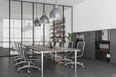 Dark office room interior with armchairs and laptop on board, side view, cabinet with folders on grey concrete floor. Modern meeting area for negotiation. 3D rendering