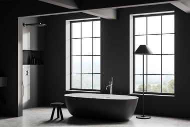 Dark bathroom interior with bathtub and shower in the corner, stool and lamp. Bathing area and panoramic window on countryside. 3D rendering