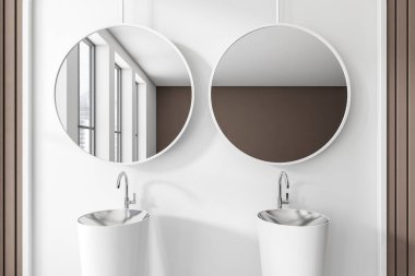Beyaz banyo içi çift lavabo ve iki yuvarlak ayna, şehir manzaralı pencere. Otel dairesindeki modern yıkama odası. 3B görüntüleme