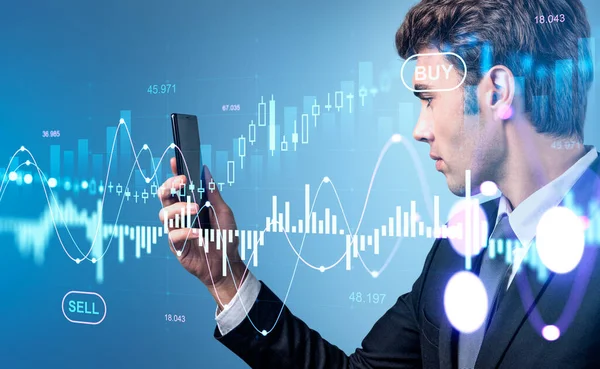 Businessman in formal wear is holding smartphone with digital interface with financial graph, chart, forex candlesticks, bar diagrams. Concept of trading on stock market, successful investment