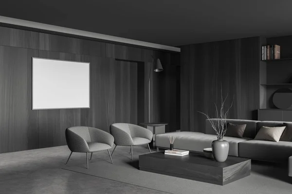Corner view on dark living room interior with empty white poster, sofa, two armchairs, coffee table, shelves, wooden wall, carpet, concrete floor. Concept of minimalist design. Mock up. 3d rendering