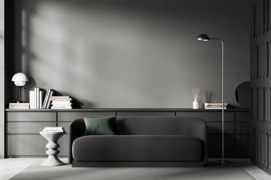 Dark living room interior with sofa and dresser with stylish decoration, carpet on grey concrete floor. Mockup copy space empty wall. 3D rendering