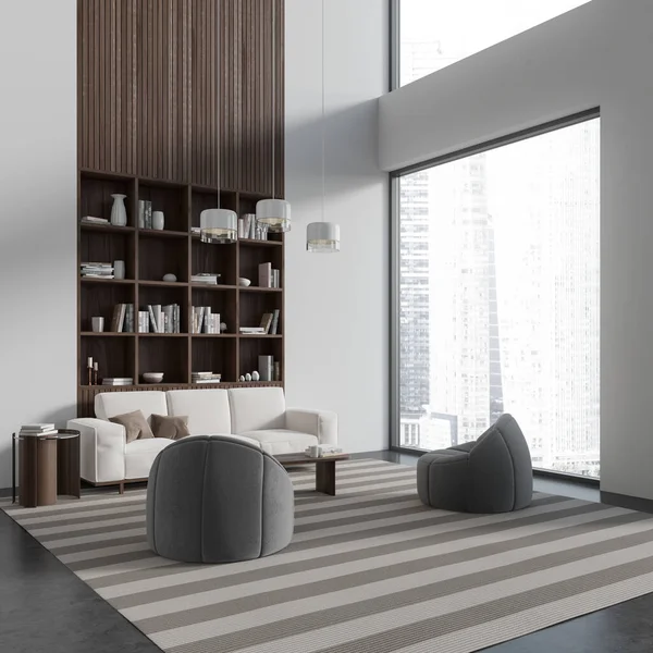 Corner view on bright living room interior with white wall, armchairs, sofa, coffee table, shelf with books, concrete floor. Concept of minimalist design, home library. Place for reading. 3d rendering