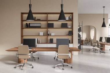 Beige coworking interior with pc desktop on work table and armchairs on light concrete floor. Office loft with modern furniture and shelf with documents. 3D rendering