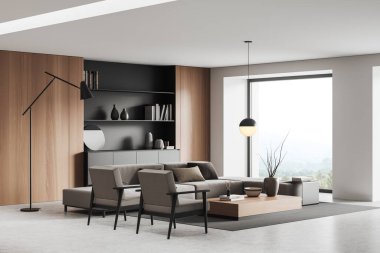 Stylish relax interior with sofa and armchairs, coffee table with art decoration, carpet on grey concrete floor. Panoramic window on countryside. 3D rendering