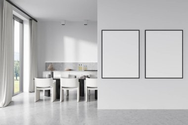 White kitchen interior with chairs and dining table, panoramic window on countryside view. Kitchenware and decoration on deck. Two mockup posters before entrance. 3D rendering