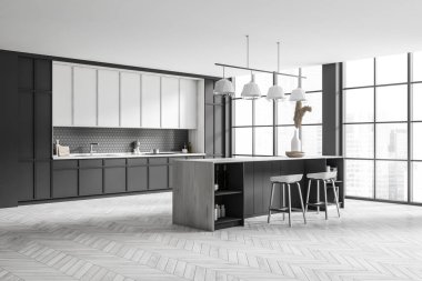 Dark kitchen interior with bar chairs and island, light grey hardwood floor. Kitchenware and decoration on shelf. Cooking area with panoramic window on city view. 3D rendering