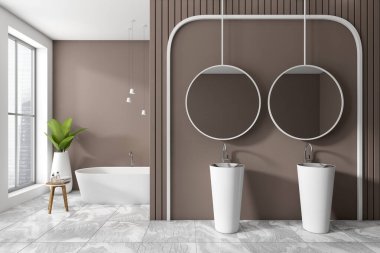 Front view on bright bathroom interior with bathtub, panoramic window with city skyscrapers view, round mirror with reflection, sinks, houseplant, brown walls. 3d rendering