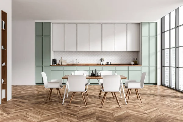 Moderne Kücheneinrichtung Mit Stühlen Und Esstisch Auf Hartholzboden Frontansicht Geschirr — Stockfoto