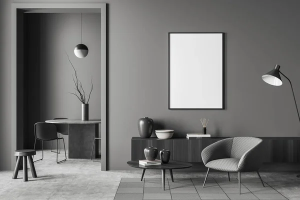 Dark living room interior with armchair and drawer with art decoration on carpet, grey concrete floor. Dining room with furniture. Mock up blank poster. 3D rendering