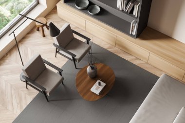 Top view of living room interior with two armchairs and sofa, coffee table and shelf with decoration, hardwood floor. Panoramic window on tropics. 3D rendering