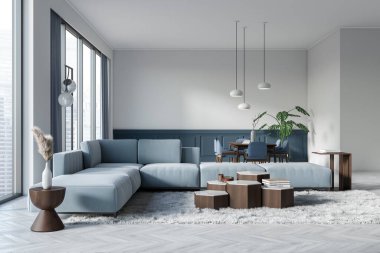 Blue and white living room interior with sofa and dining area. Coffee table with decoration, carpet on hardwood floor. Panoramic window on skyscrapers. 3D rendering