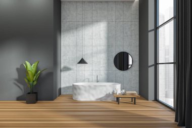 Dark bathroom interior with bathtub, table with accessories, plant on hardwood floor. Washing space in hotel apartment with panoramic window on Singapore city view. 3D rendering