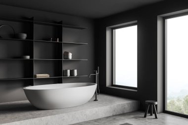 Dark bathroom interior with bathtub on podium, mixer mounted, grey concrete floor. Shelf with decoration, stool and panoramic window on countryside. 3D rendering