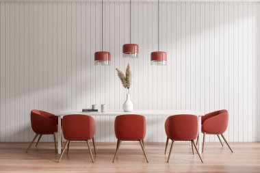 Light dining interior with white table and red armchairs, hardwood floor. Minimalist meeting area with decoration and lamps. 3D rendering