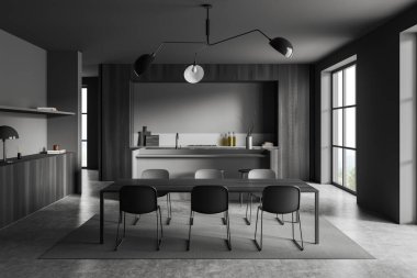 Dark kitchen interior with dining table, chairs, bar island on grey concrete floor. Eating room with kitchenware and decoration, panoramic window on countryside. 3D rendering