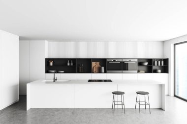 White kitchen interior with long bar island and chairs, grey concrete floor. Kitchenware on shelves, cooking area with panoramic window on skyscrapers. 3D rendering