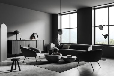 Dark living room interior with sofa and two armchairs, side view, coffee table and drawer with decoration, carpet on grey concrete floor. Panoramic window on countryside. 3D rendering