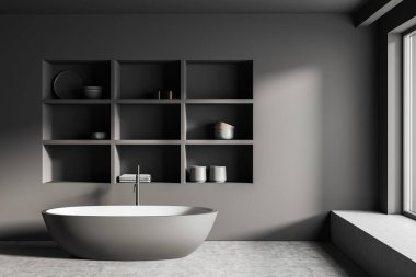 Dark bathroom interior with bathtub, shelf rack with accessories, grey concrete floor. Washing space in hotel apartment with window. 3D rendering