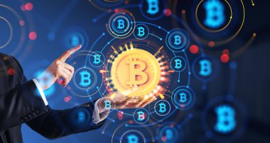 Hands of unrecognizable businessman in suit using futuristic HUD cryptocurrency interface over blurry dark blue background. Concept of blockchain and risk management