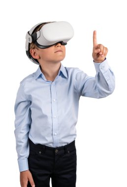 Child boy portrait wearing vr glasses headset, finger touching something. Isolated over white background. Concept of e-learning and metaverse