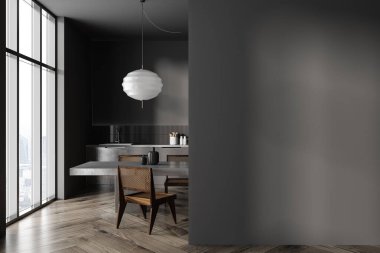 Interior of stylish kitchen with gray walls, dark wooden floor, counters with built in sink and big dining table. Panoramic window and mock up wall on the right. 3d rendering