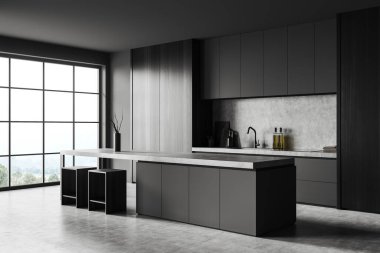 Corner of stylish kitchen with gray walls, concrete floor, gray and wooden cabinets and bar counter with stools. Window with blurry mountain view. 3d rendering