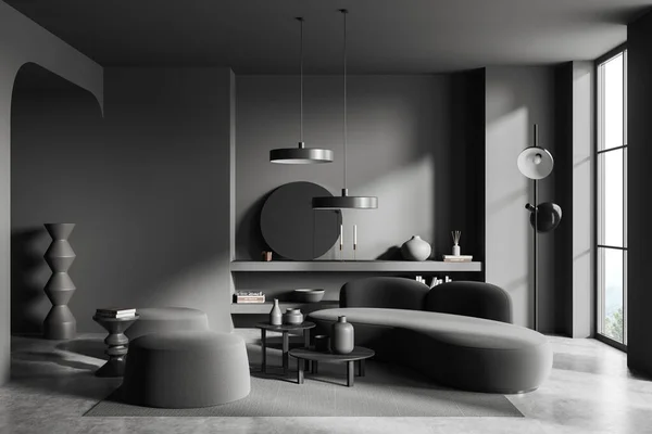时尚客厅的内部 墙壁灰暗 地板混凝土 舒适的沙发站在圆圆的咖啡桌旁边 上方架子上有圆形的镜子 3D渲染 — 图库照片