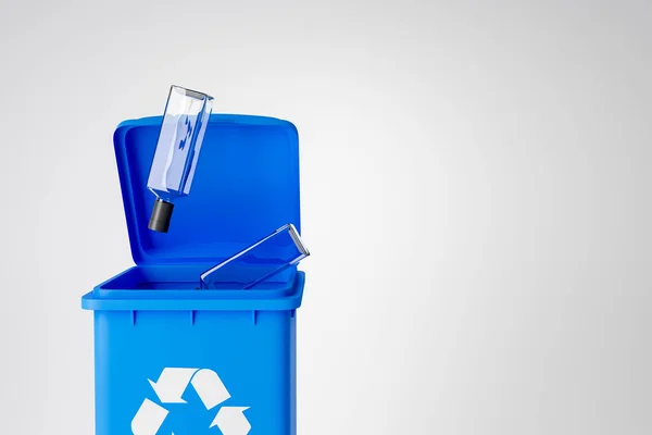 Blauwe Prullenbak Met Vallende Glazen Flessen Concept Van Recycling Hergebruik — Stockfoto