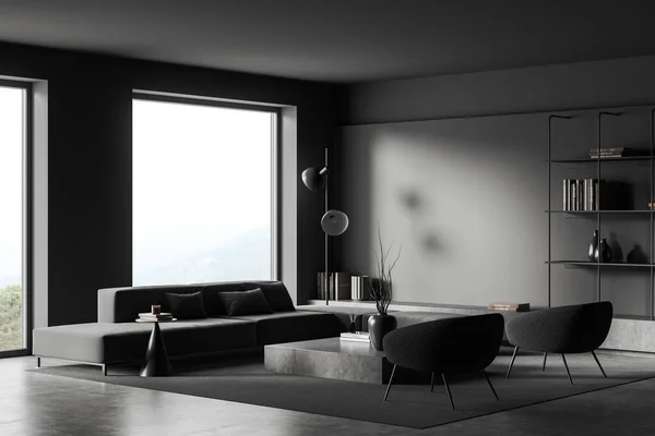 ソファと2つのアームチェア サイドビュー コーヒーテーブルとグレーのコンクリートの床に装飾が施された棚と暗いリビングルームのインテリア 田舎のパノラマの窓 モックアップ空の灰色の壁 3Dレンダリング — ストック写真