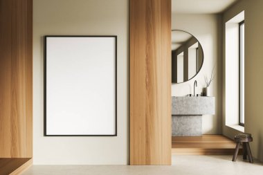 Modern banyoda asılı, beyaz ve ahşap duvarları ve yuvarlak aynalı büyük lavabosu olan poster çerçevesi dikey olarak taklit edilir. 3d oluşturma