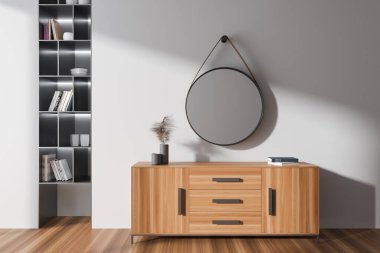 Süslü beyaz oturma odasının içi ahşap çekmeceli, yuvarlak aynalı ve minimalist raflı kütüphane ve sanat dekorasyonlu. 3B görüntüleme