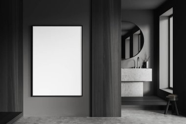 Gri ve ahşap duvarları ve yuvarlak aynalı büyük lavabosu olan şık bir banyoda asılı poster çerçevesi. 3d oluşturma