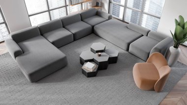 Beyaz duvarları, ahşap zemini, iki gri koltuğu, kahverengi koltuğu ve altıgen sehpası olan modern oturma odasının en üst manzarası. Bulanık şehir manzaralı pencereler. 3d oluşturma