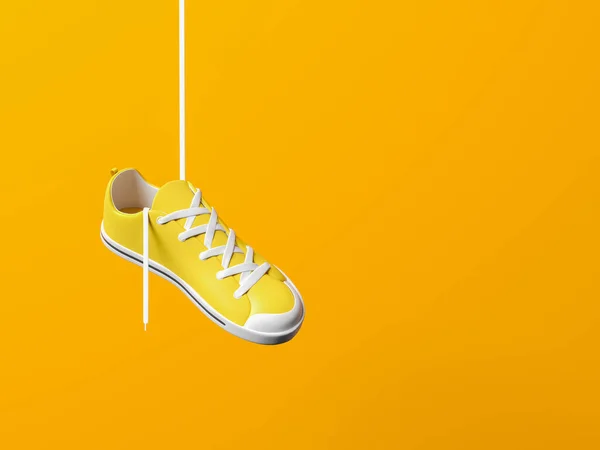 Een Gele Sneaker Hangend Een Witte Kant Lege Kopieerruimte Achtergrond — Stockfoto