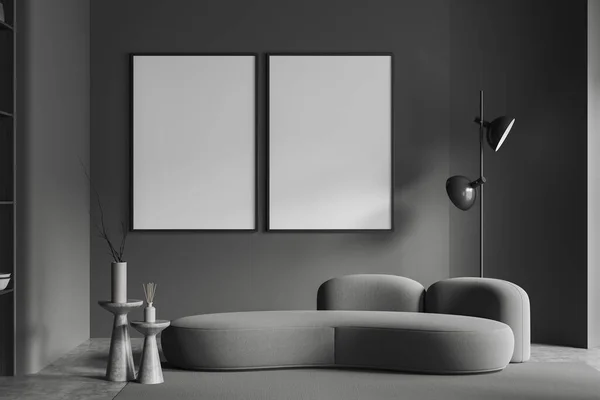 现代客厅室内有灰色墙壁 混凝土地板 舒适的灰色沙发 落地灯和两个垂直的模拟画框 3D渲染 — 图库照片