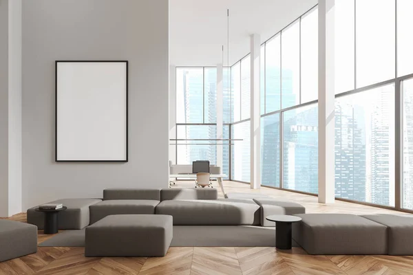 背景に白い壁 木製の床 灰色のソファとオープンスペースエリアとモダンなオフィス待合室のインテリア ぼんやりとした街並みのポスターや窓を縦にモックアップ 3Dレンダリング — ストック写真